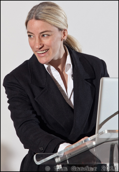 Conference speaker on video monitor.