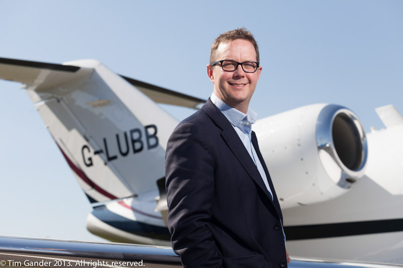 CEO Phil Brockwell in front of a Citation 525 jet aircraft at Bristol Flying Centre