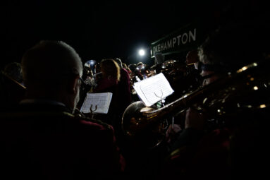 Hatherleigh Silver Band plays in the early dawn dark at the reopening of Okehampton railway station.