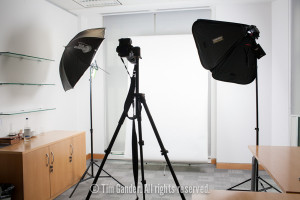 a portable studio lighting set-up in an office