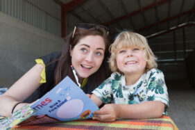 07/06/2015 Hosted at Meadowlea Farm in Compton Durville, Somerset, ABP Food Group staff get stuck in with Open Farm Sunday to help members of the public understand where their food comes from and how it's produced. Robyn Smyth of ABP helps young visitor Tom with a bit of colouring in. © Tim Gander 2015. All rights reserved.