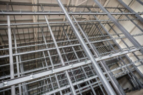 The steel lattice structure inside the new storage facility taken at an upward angle.