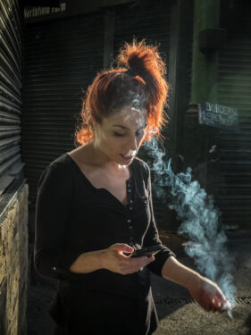 30/04/2016 32-year-old Victoria Venteo takes a cigarette break towards the end of her shift as a waitress at Bedales wine bar in Borough Market, Southwark, London, UK. Photo © Tim Gander 2016. All rights reserved.