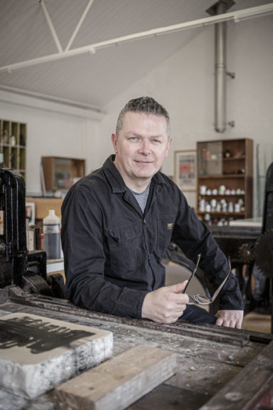 Portrait of artist printer Michael Gill in his studio in Frome.