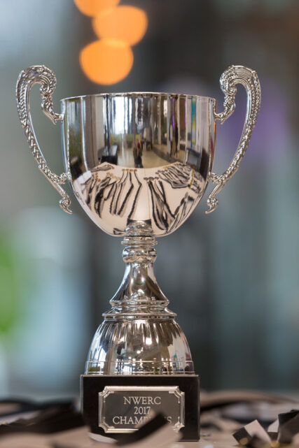 A silver trophy sits on a table awaiting the prize-giving.