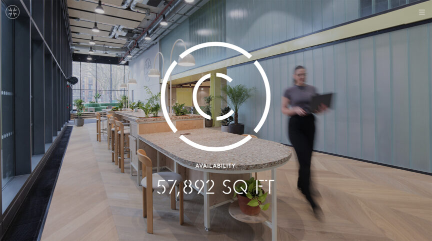 Screenshot from the Assembly C website showing the open-plan reception area with the letter C layered over and the square footage available. A blurred female figure is striding through the photograph, carrying an opened laptop.